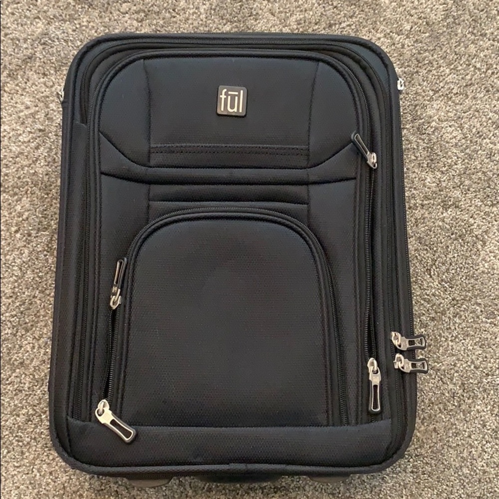 Little suitcase with lots of pockets soooo nice